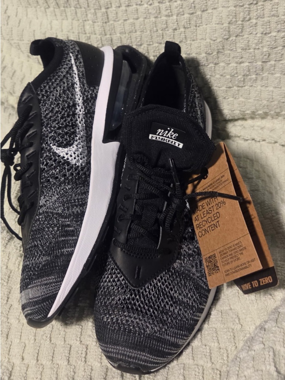 Nike Men’s Black and White Flyknit Running Shoes